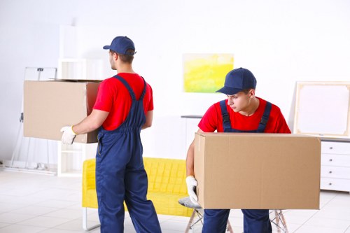 Movers Wimbledon team preparing a safe home removal with protective packing materials