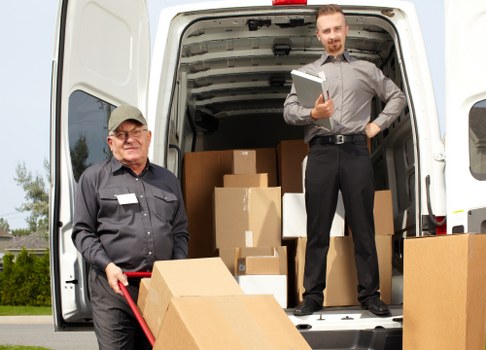 Unloading boxes into a new Wimbledon home during a house move