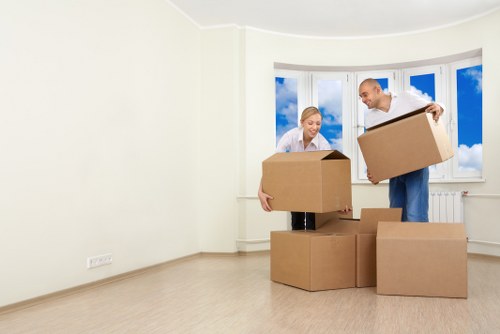 Moving boxes and household items ready for transport in Wimbledon
