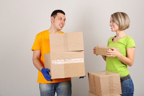 Business furniture being moved through a Wimbledon office building