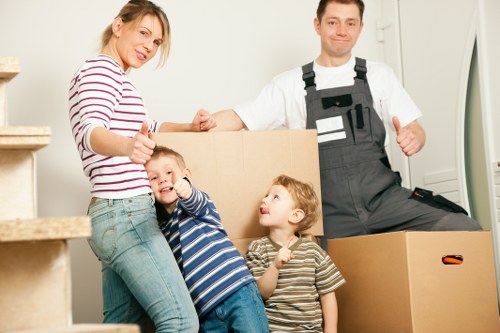 Moving team handling a busy Wimbledon street relocation